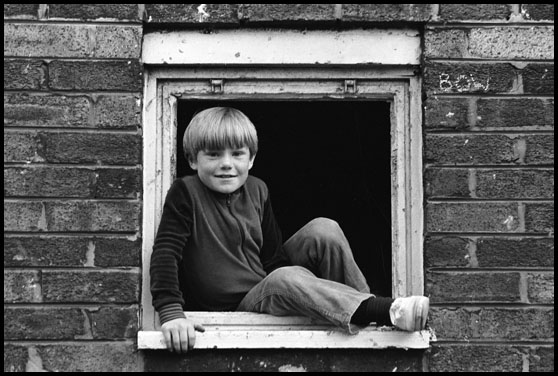 boy in the window frame